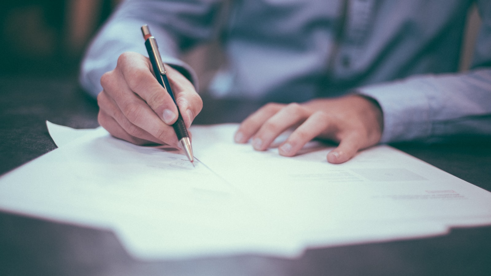 Hand signing finance documents