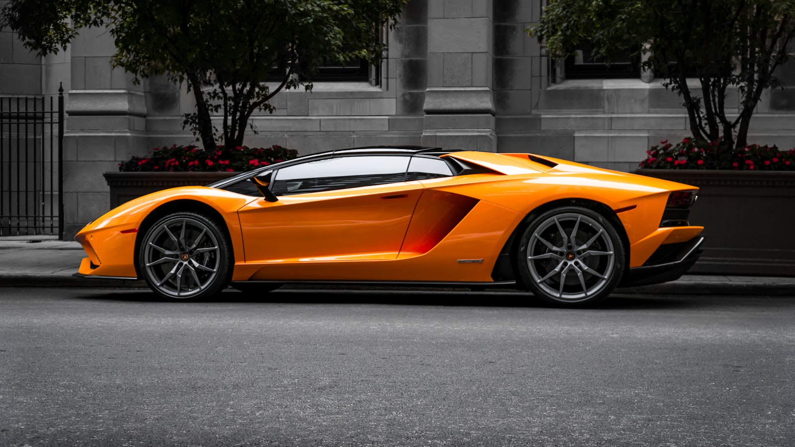Sport car in city street — temptation of buying more than you can afford